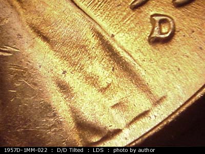 Die-stage C marker on 1957D•1MM•022 (1957 Repunched Mint Mark).