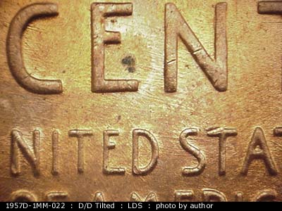 Die-stage C marker on 1957D•1MM•022 (1957 Repunched Mint Mark).