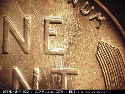 Die-stage A marker on 1957D•1MM•023 (1957 Repunched Mint Mark).