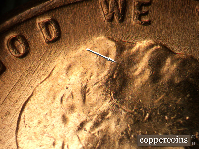 Die-stage B marker on 1957D•1MM•024 (1957 Repunched Mint Mark).