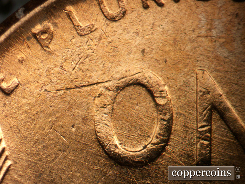 Die-stage B marker on 1957D•1MM•024 (1957 Repunched Mint Mark).
