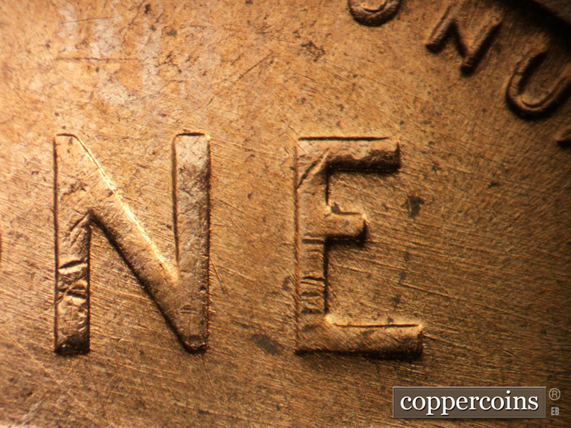 Die-stage B marker on 1957D•1MM•024 (1957 Repunched Mint Mark).