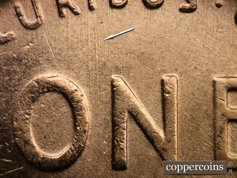 Die-stage B marker on 1957D•1MM•026 (1957 Repunched Mint Mark).