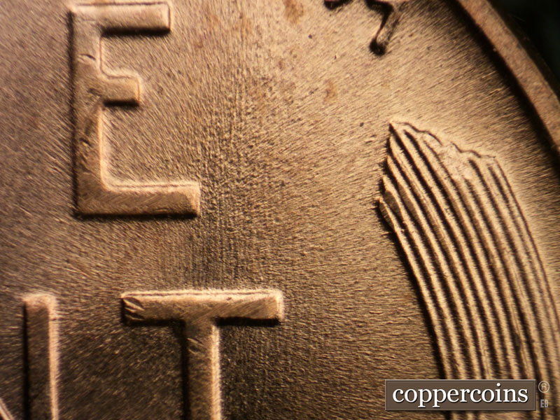Die-stage B marker on 1957D•1MM•026 (1957 Repunched Mint Mark).