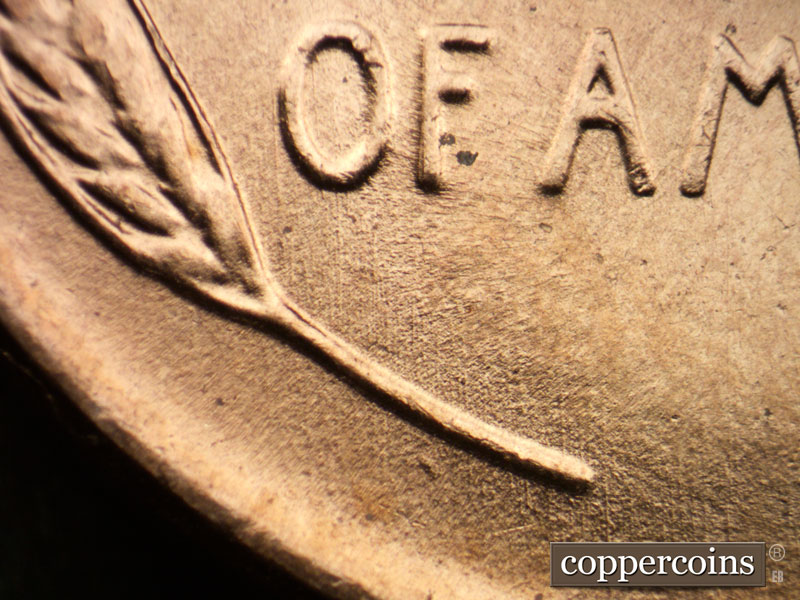Die-stage B marker on 1957D•1MM•026 (1957 Repunched Mint Mark).
