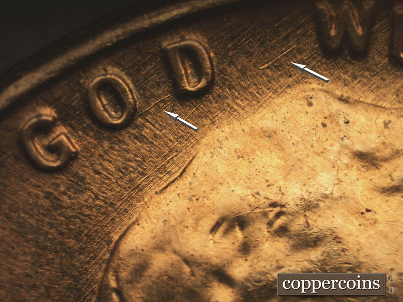 Die-stage B marker on 1957D•1MM•027 (1957 Repunched Mint Mark).