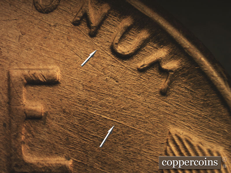 Die-stage B marker on 1957D•1MM•027 (1957 Repunched Mint Mark).