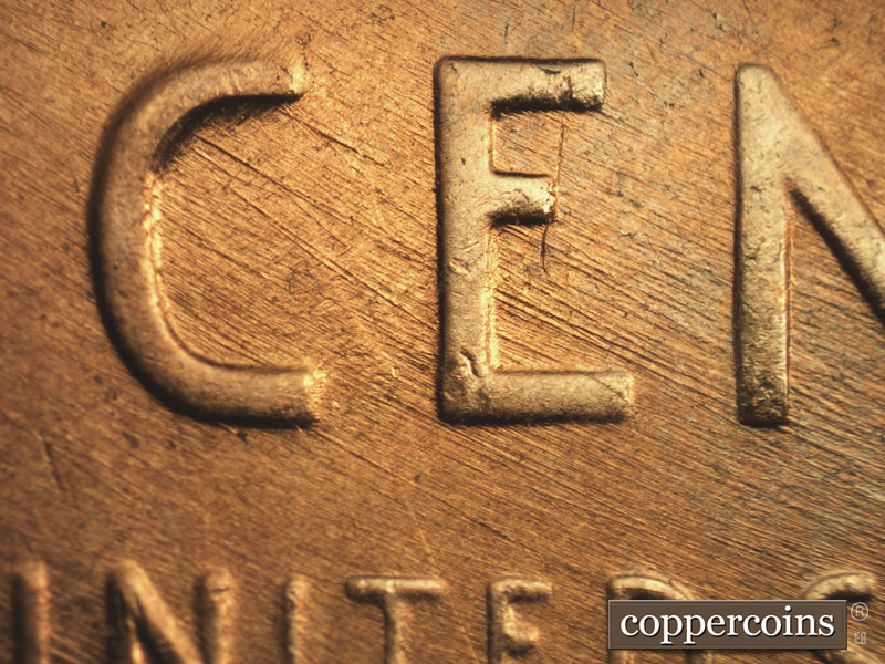 Die-stage B marker on 1957D•1MM•027 (1957 Repunched Mint Mark).