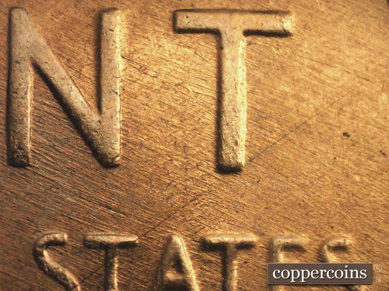 Die-stage B marker on 1957D•1MM•027 (1957 Repunched Mint Mark).