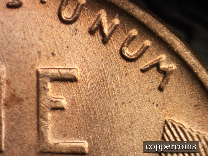 Die-stage A marker on 1957D•1MM•028 (1957 Repunched Mint Mark).