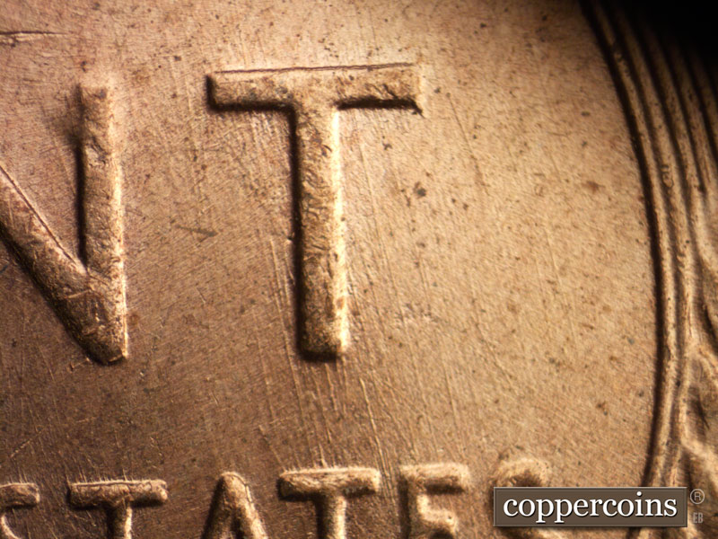 Die-stage A marker on 1957D•1MM•028 (1957 Repunched Mint Mark).