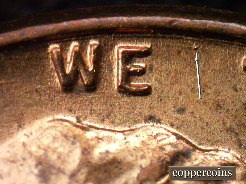 Die-stage B marker on 1957D•1MM•028 (1957 Repunched Mint Mark).