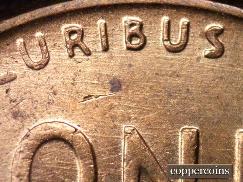 Die-stage B marker on 1957D•1MM•028 (1957 Repunched Mint Mark).