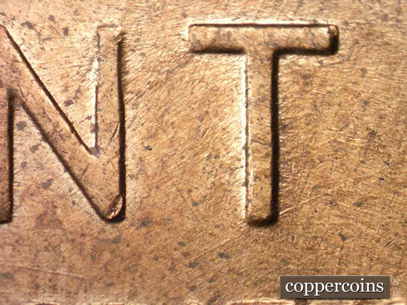 Die-stage B marker on 1957D•1MM•028 (1957 Repunched Mint Mark).