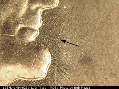 Die-stage B marker on 1957D•1MM•029 (1957 Repunched Mint Mark).