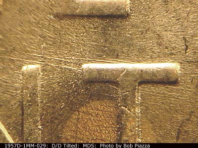 Die-stage B marker on 1957D•1MM•029 (1957 Repunched Mint Mark).