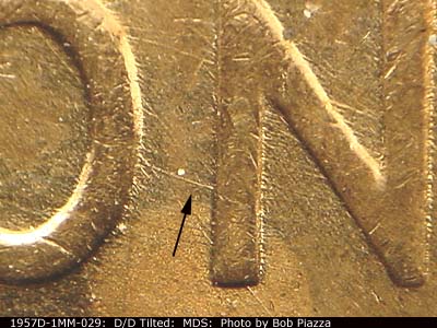 Die-stage B marker on 1957D•1MM•029 (1957 Repunched Mint Mark).