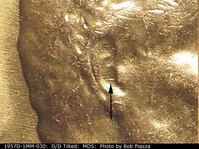 Die-stage B marker on 1957D•1MM•030 (1957 Repunched Mint Mark).