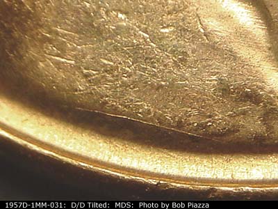 Die-stage B marker on 1957D•1MM•031 (1957 Repunched Mint Mark).