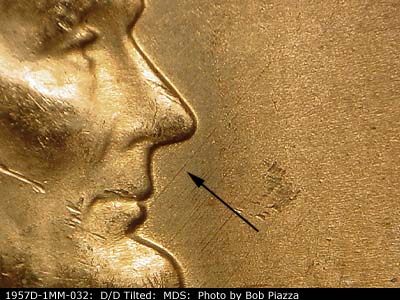Die-stage B marker on 1957D•1MM•032 (1957 Repunched Mint Mark).