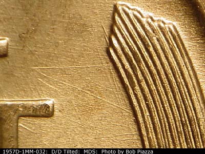 Die-stage B marker on 1957D•1MM•032 (1957 Repunched Mint Mark).