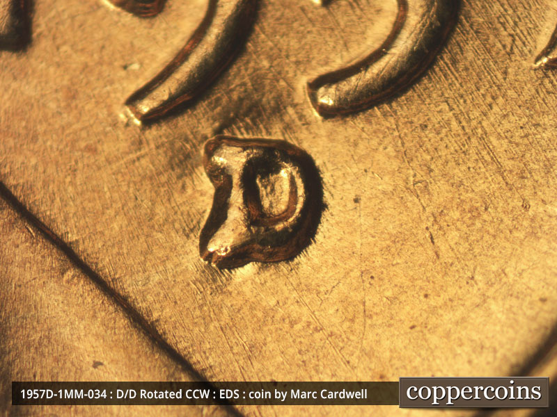 Die-stage A marker on 1957D•1MM•034 (1957 Repunched Mint Mark).