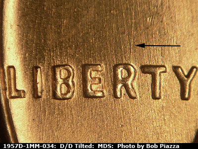 Die-stage B marker on 1957D•1MM•034 (1957 Repunched Mint Mark).