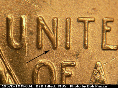 Die-stage B marker on 1957D•1MM•034 (1957 Repunched Mint Mark).