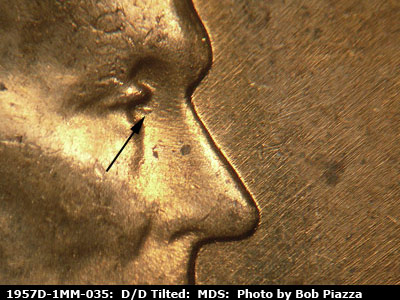 Die-stage B marker on 1957D•1MM•035 (1957 Repunched Mint Mark).