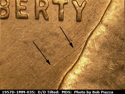 Die-stage B marker on 1957D•1MM•035 (1957 Repunched Mint Mark).