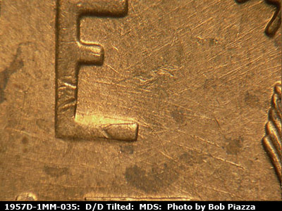 Die-stage B marker on 1957D•1MM•035 (1957 Repunched Mint Mark).