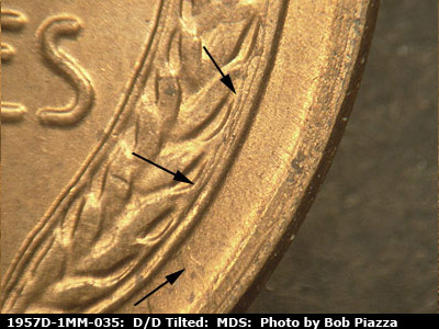 Die-stage B marker on 1957D•1MM•035 (1957 Repunched Mint Mark).
