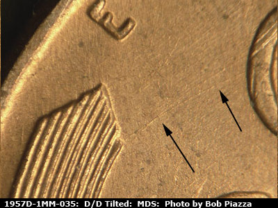 Die-stage B marker on 1957D•1MM•035 (1957 Repunched Mint Mark).