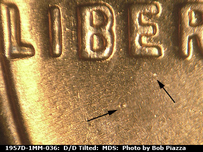 Die-stage B marker on 1957D•1MM•036 (1957 Repunched Mint Mark).