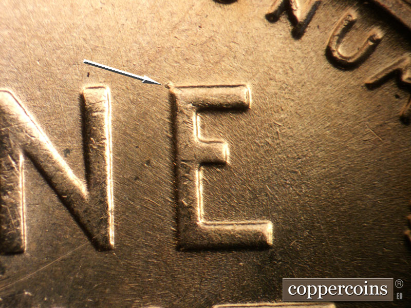 Die-stage B marker on 1957D•1MM•037 (1957 Repunched Mint Mark).