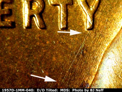 Die-stage B marker on 1957D•1MM•040 (1957 Repunched Mint Mark).