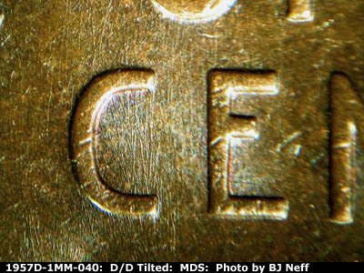 Die-stage B marker on 1957D•1MM•040 (1957 Repunched Mint Mark).