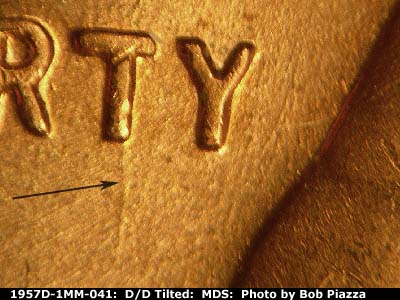 Die-stage B marker on 1957D•1MM•041 (1957 Repunched Mint Mark).