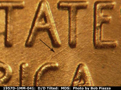 Die-stage B marker on 1957D•1MM•041 (1957 Repunched Mint Mark).
