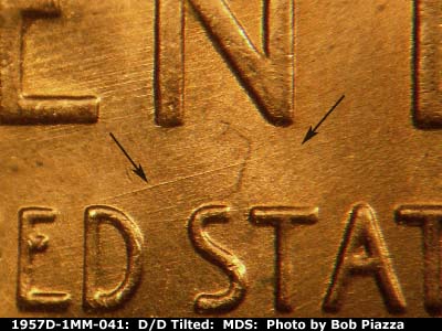 Die-stage B marker on 1957D•1MM•041 (1957 Repunched Mint Mark).