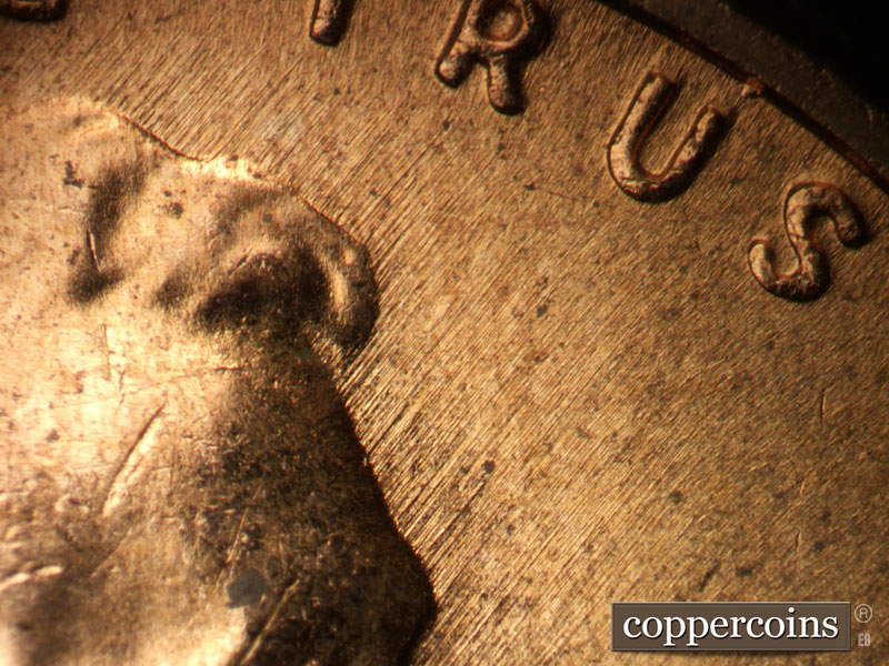 Die-stage C marker on 1957D•1MM•041 (1957 Repunched Mint Mark).