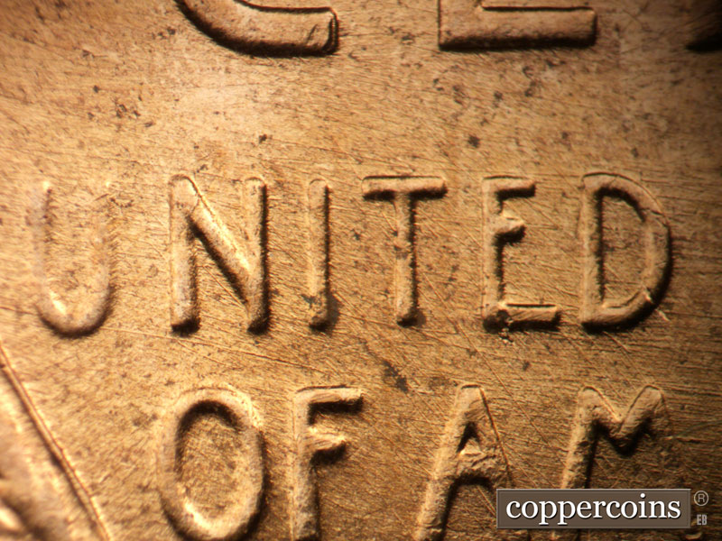 Die-stage C marker on 1957D•1MM•041 (1957 Repunched Mint Mark).