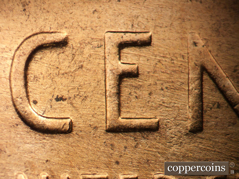 Die-stage C marker on 1957D•1MM•041 (1957 Repunched Mint Mark).