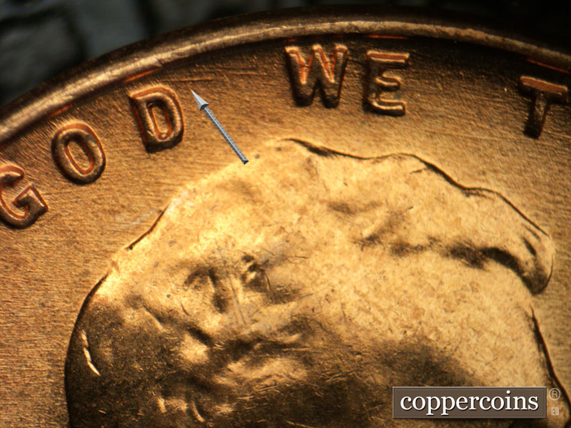 Die-stage B marker on 1957D•1MM•044 (1957 Repunched Mint Mark).