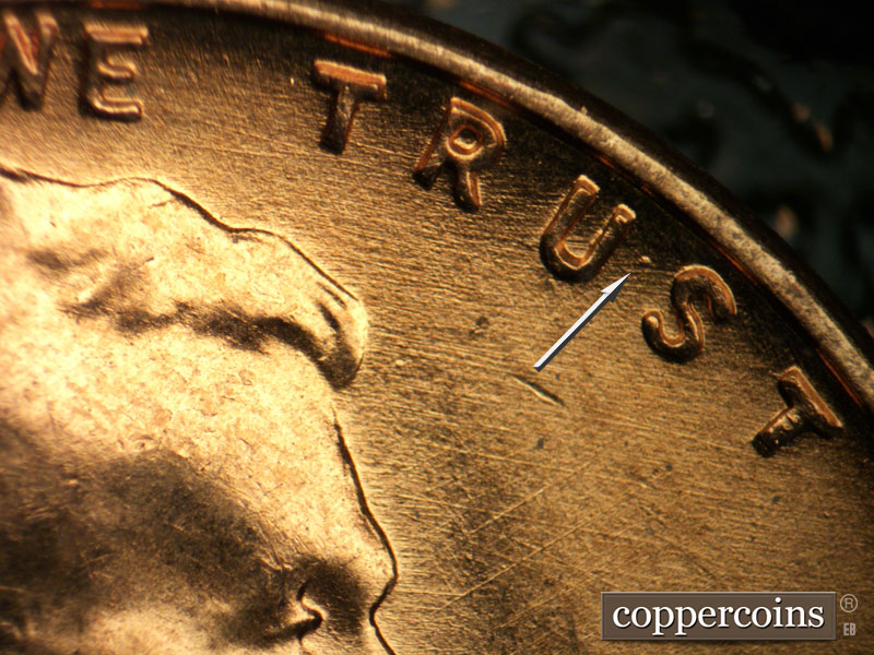 Die-stage B marker on 1957D•1MM•044 (1957 Repunched Mint Mark).