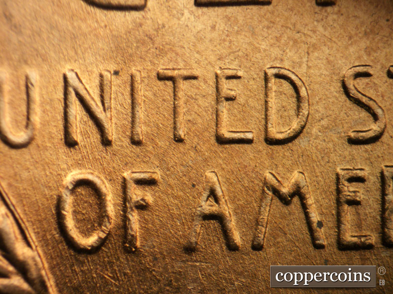 Die-stage B marker on 1957D•1MM•044 (1957 Repunched Mint Mark).