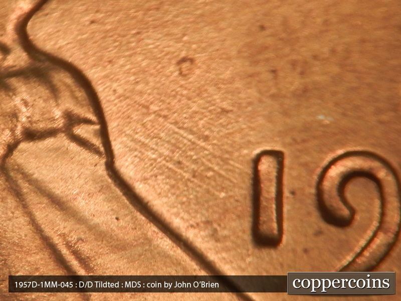 Die-stage B marker on 1957D•1MM•045 (1957 Repunched Mint Mark).