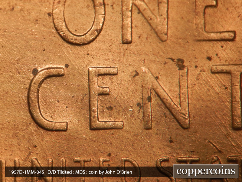 Die-stage B marker on 1957D•1MM•045 (1957 Repunched Mint Mark).