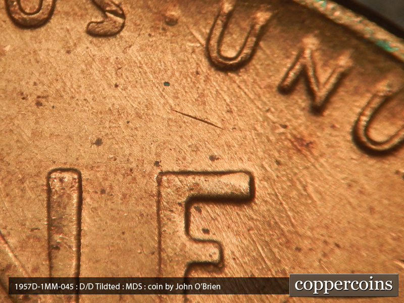 Die-stage B marker on 1957D•1MM•045 (1957 Repunched Mint Mark).