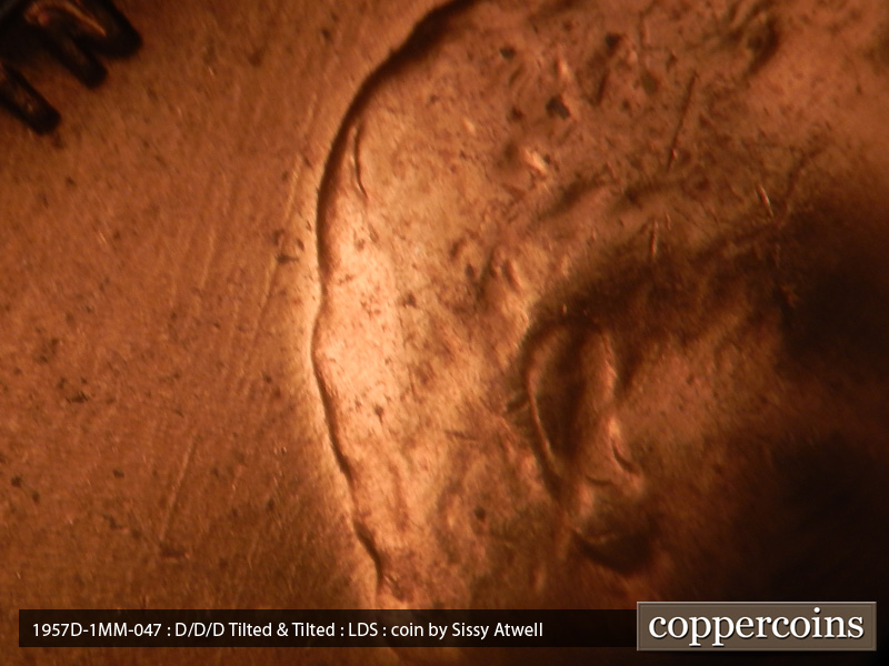 Die-stage C marker on 1957D•1MM•047 (1957 Repunched Mint Mark).